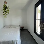 Double Room With Private Bathroom In Shared Home With Distant Sea View